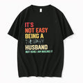 Original Its Not Easy Being A Trophy Husband But Here I Am Nailing It Tshirts